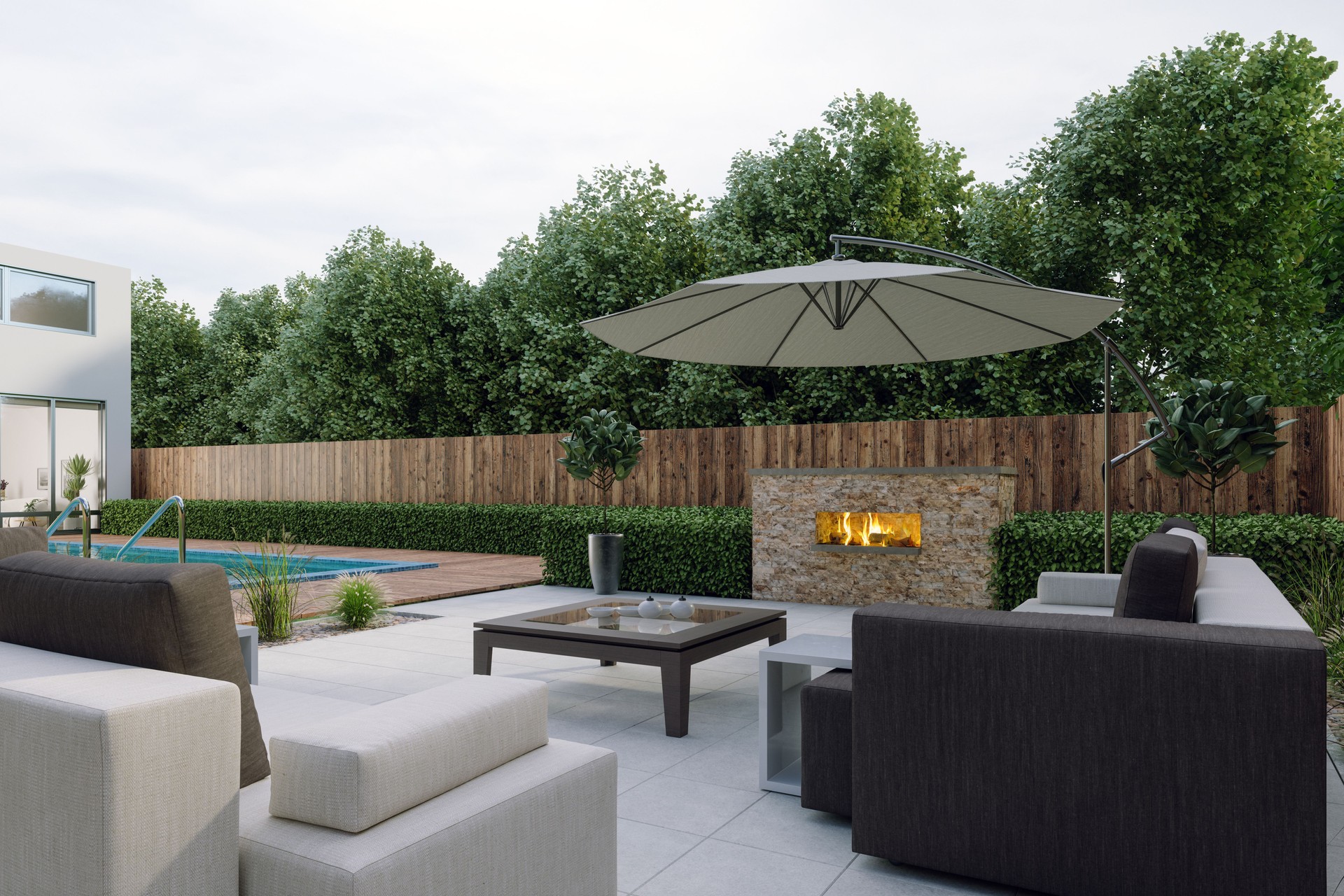 Villa Patio With Sofa, Armchair, Swimming Pool, Parasol And Burning Fireplace